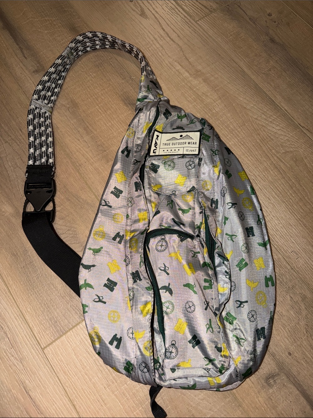 Kavu True Outdoor Wear Gray Sling Bag with Green & Yellow Outdoor Motif